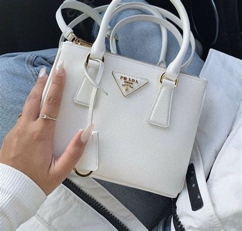 small white prada purse.